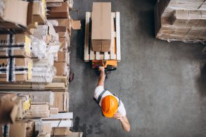 16617-300x200 Young man working at a warehouse with boxes